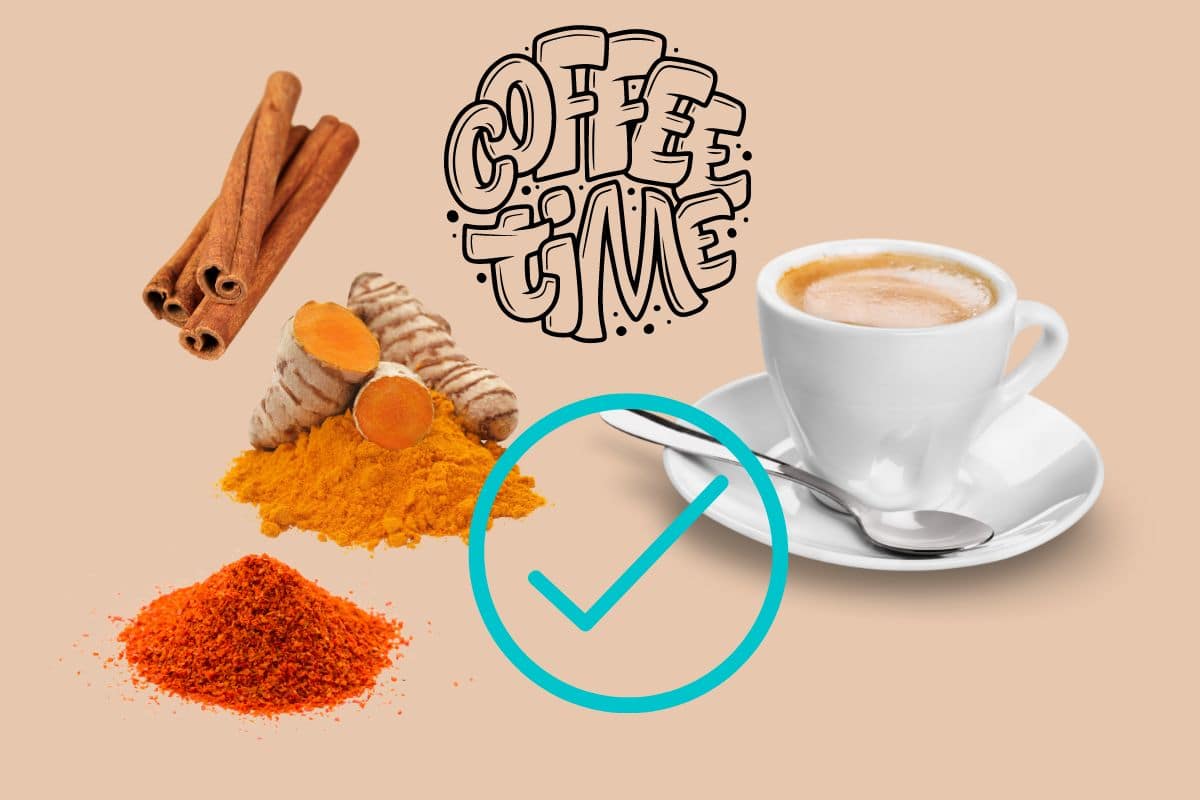 Tazzina di caffè con vicino cannella, curcuma e pepe di cayenna